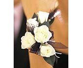 5 White Mini Roses Wristlet in Ellicott City MD, Wessel's Florist & Weddings